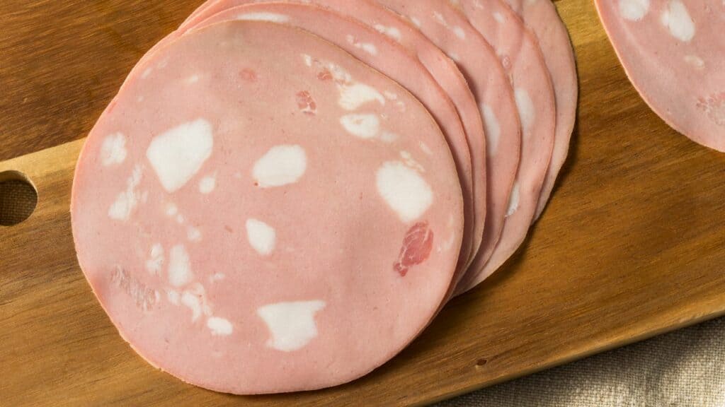 cutted bologna on the table